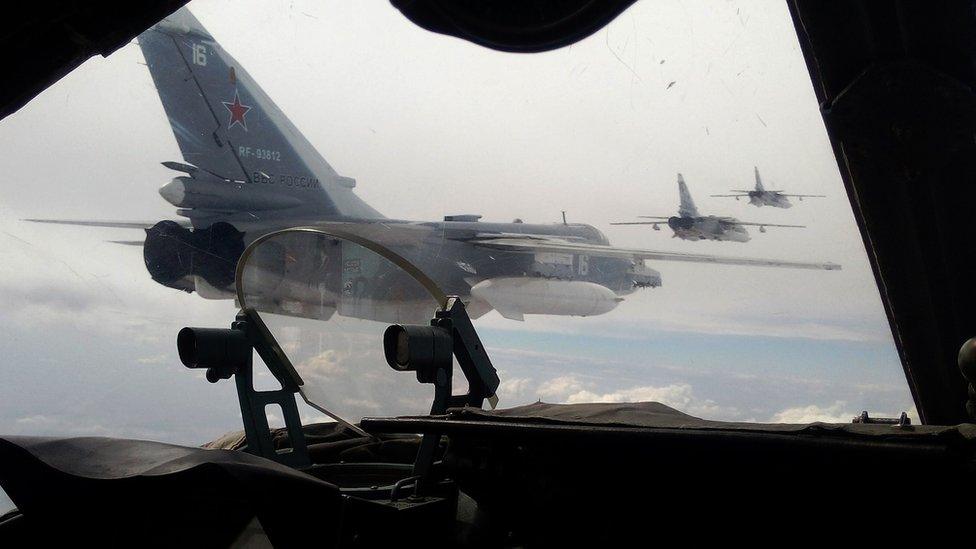 Russian Air Force Su-24 bombers fly during a military exercise in southern Russia