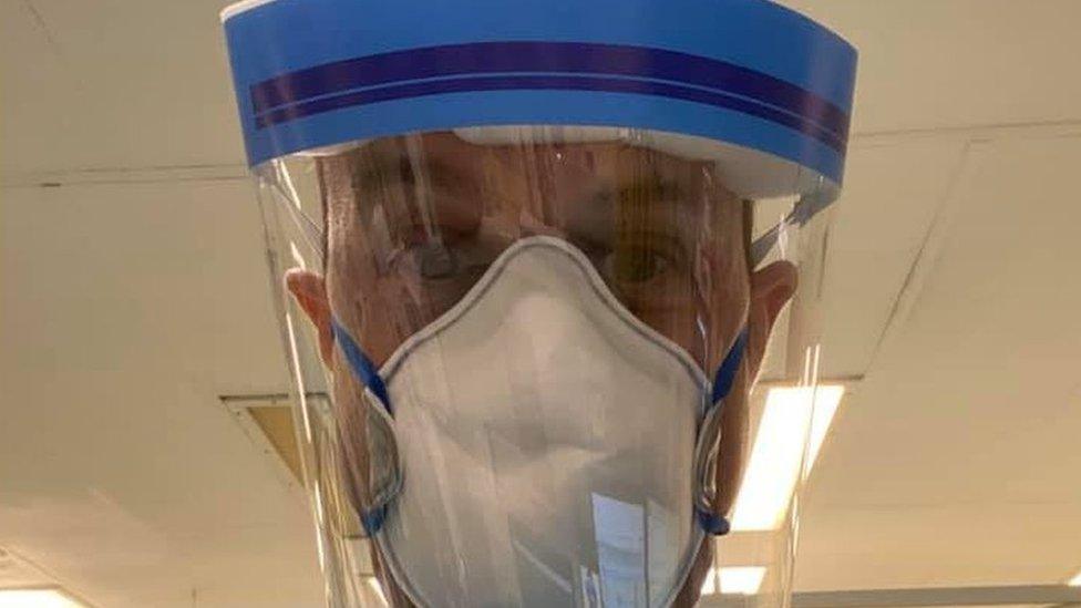 Dan Harvey wearing coronavirus protective equipment