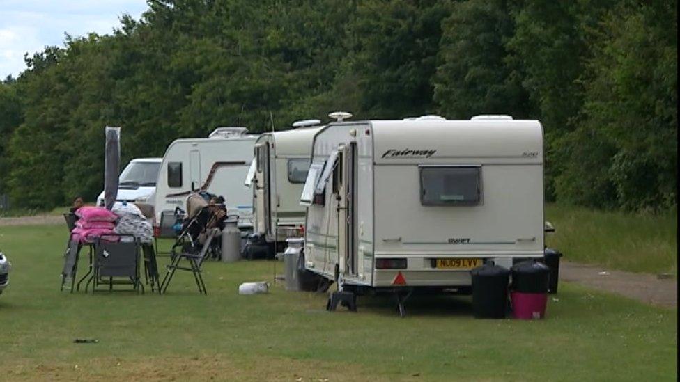 Caravans in a field