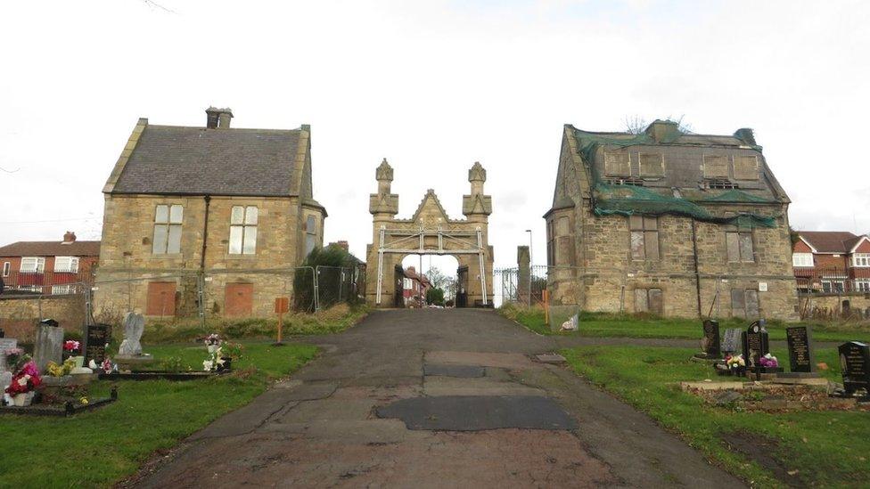 Two old stone buildings at the entrance to St John's cemetery