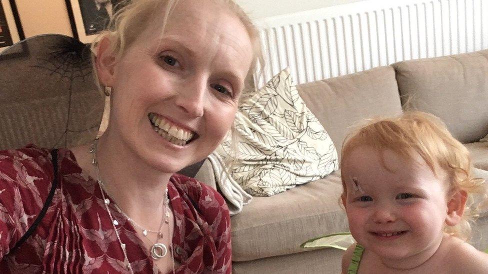 Jo Daniels, who depends on male blood donors to keep her sight, posing with her daughter