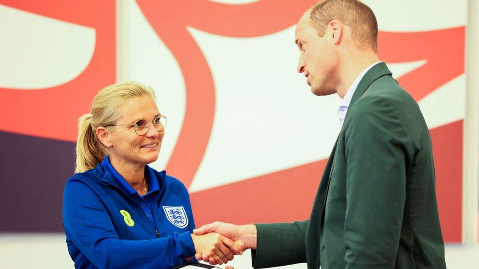 The Prince of Wales presents an honorary CBE to England manager Sarina Wiegman,