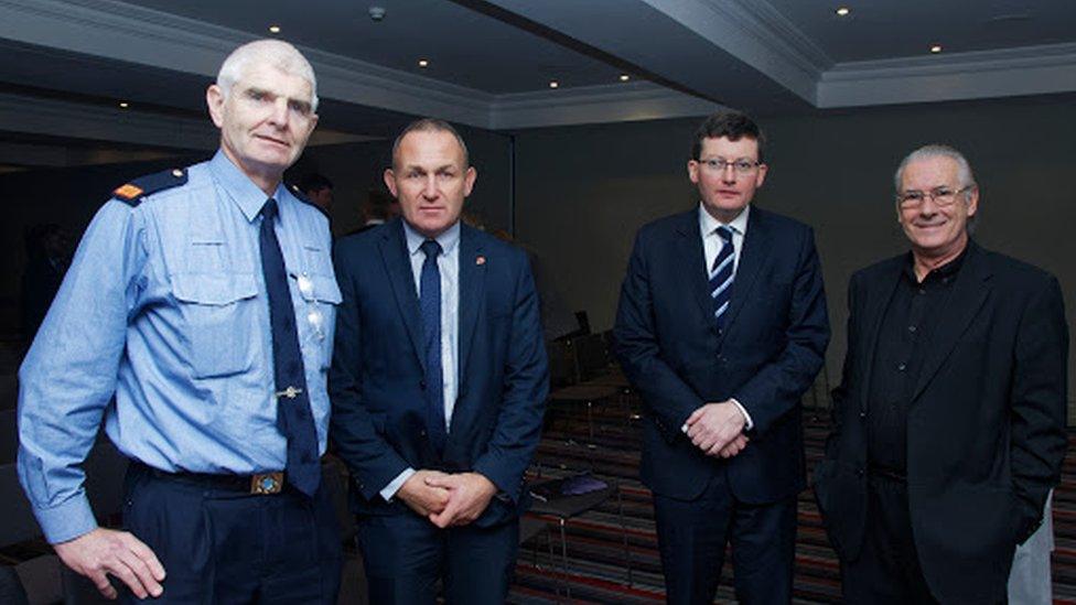 Garda Inspector Tony Twomey and PSNI Detective Inspector David Henderson with members of Safer Blanchardstown