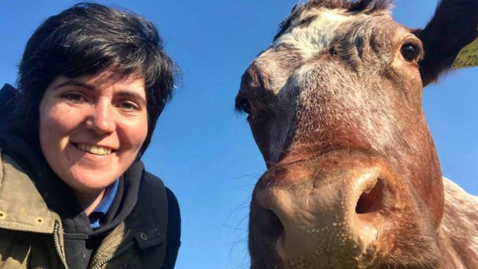 Abi Reader and her cow