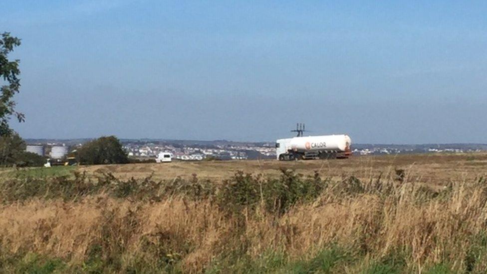 Fuel tankers accessing the site through fields