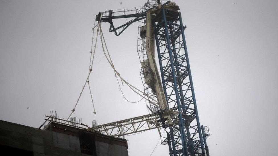 Broken crane is pictured in downtown Miami