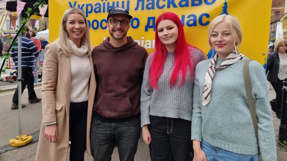 Tanya and Sonya with their hosts during a trip to Henley