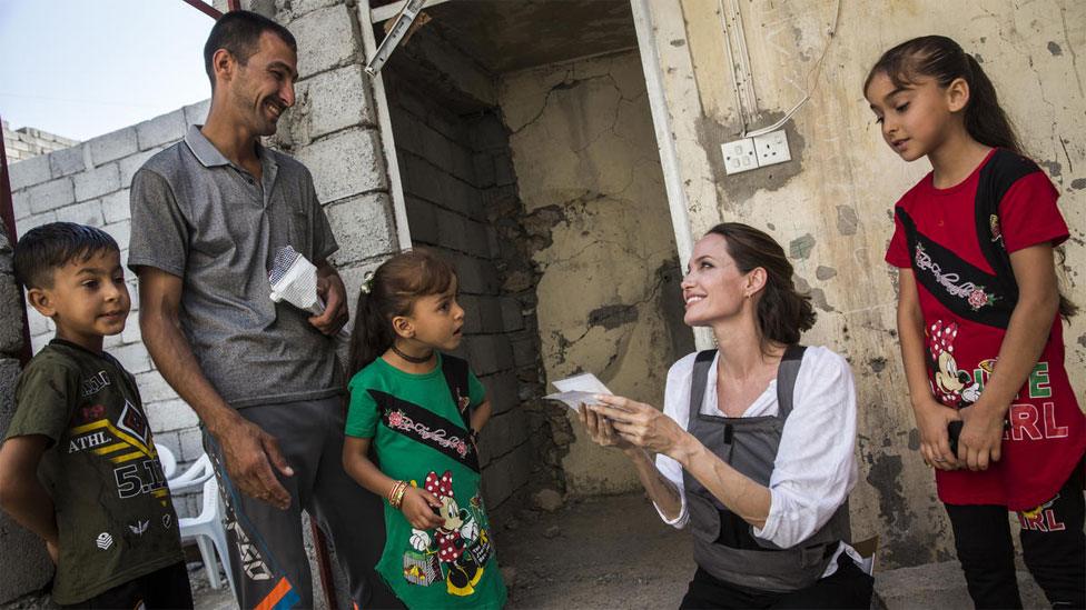 Angelina Jolie and an Iraqi family