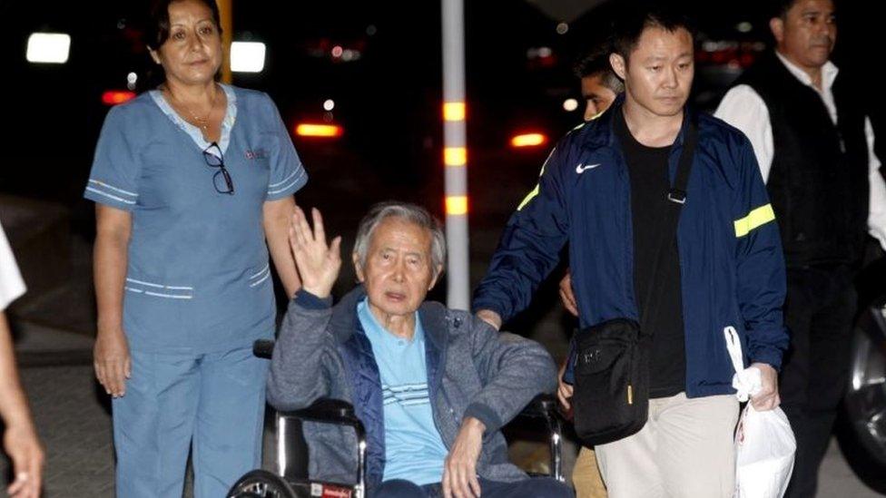 Former Peruvian President Alberto Fujimori accompanied by his son Kenji Fujimori (R) leaves the Centenary hospital in Lima, Peru, January 4, 2018.