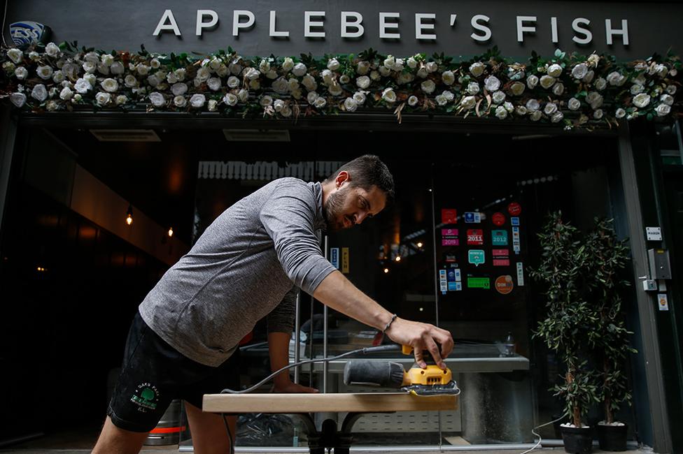 Preparations at Applebee's Fish to take dining outside