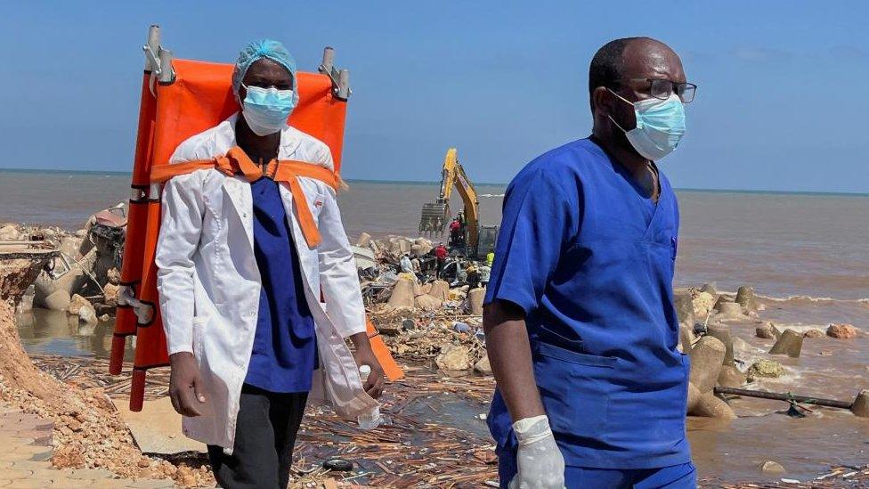 Rescuers by the sea in Derna