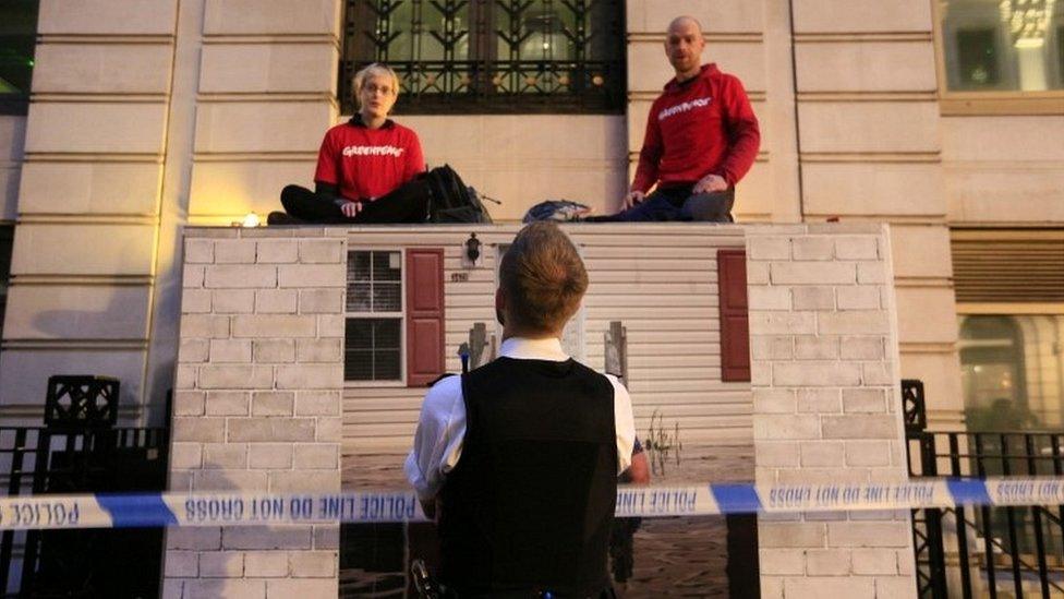 Greenpeace protesters blocking building