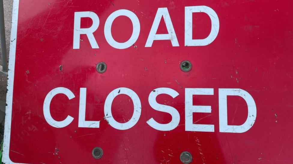 Road closed sign