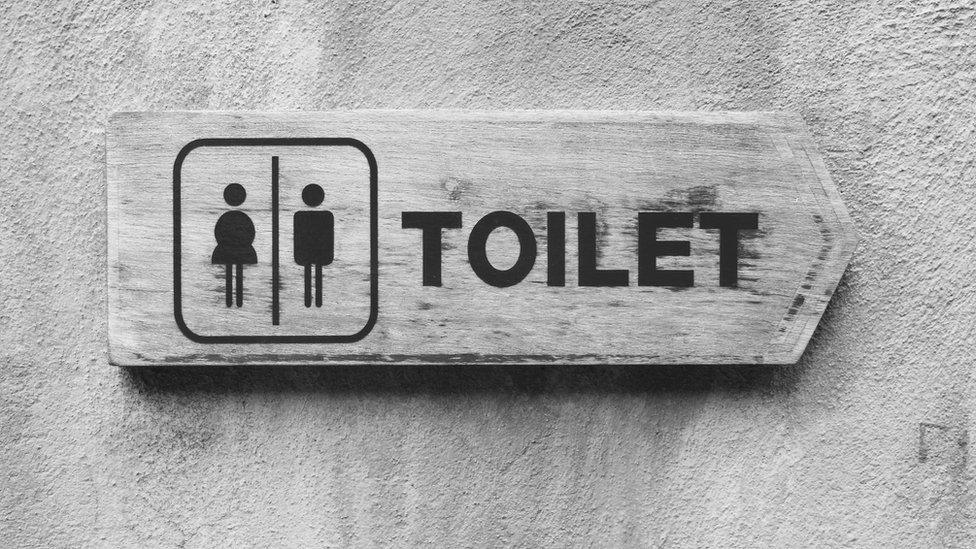 Toilet sign