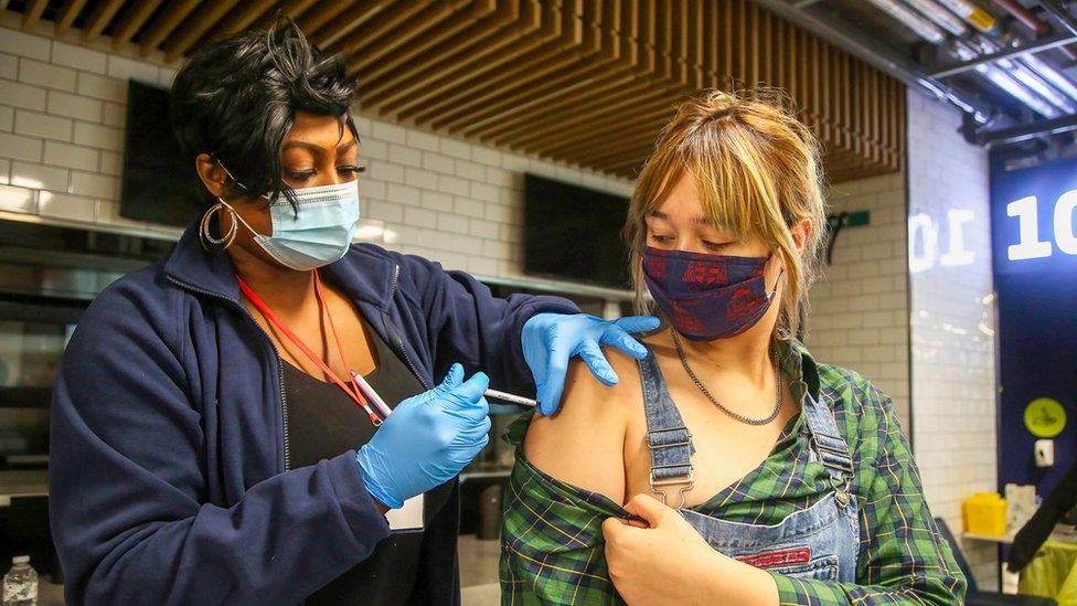 Young woman is vaccinated