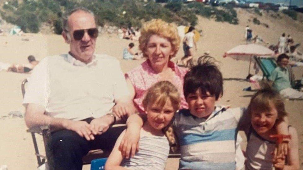 The family on holiday on a beach