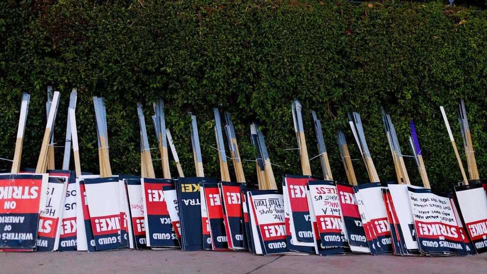 Picket signs are placed upside down unused