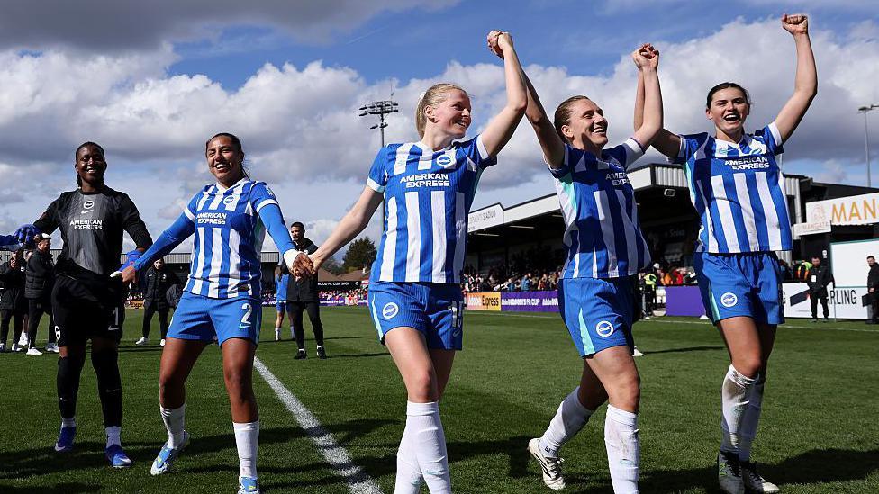 Brighton players celebrate