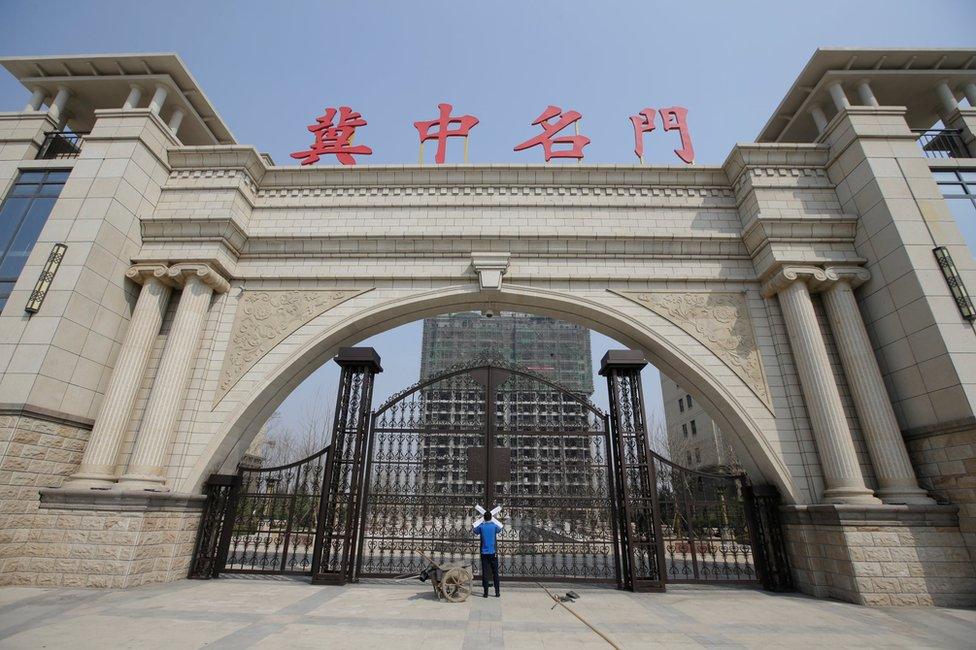 A seal is placed on the gates of a property as the government banned new property sales in counties earmarked as part of a new special economic zone in Xiongxian, Hebei province, China, 3 April 2017.