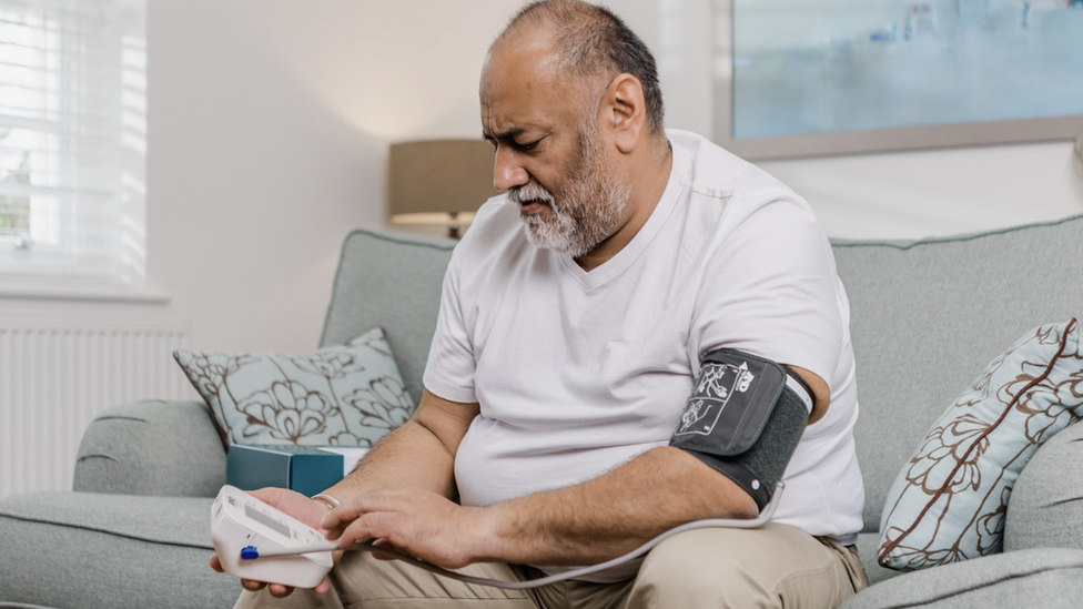 Man using virtual ward equipment