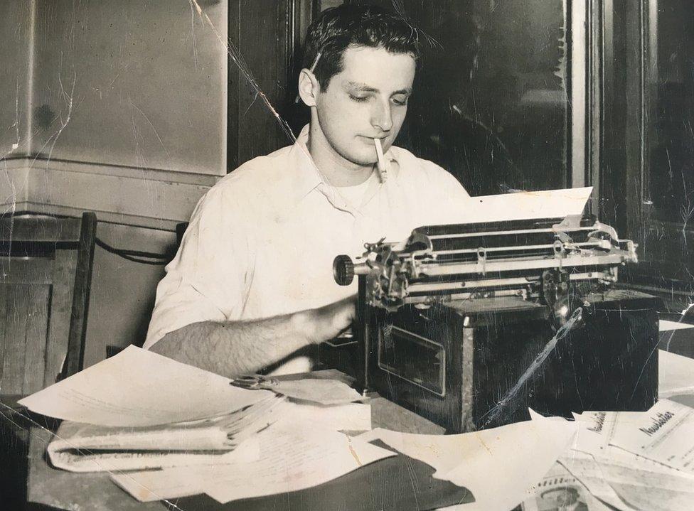 Leon Kamin works on a typewriter during his time as a student at Harvard University