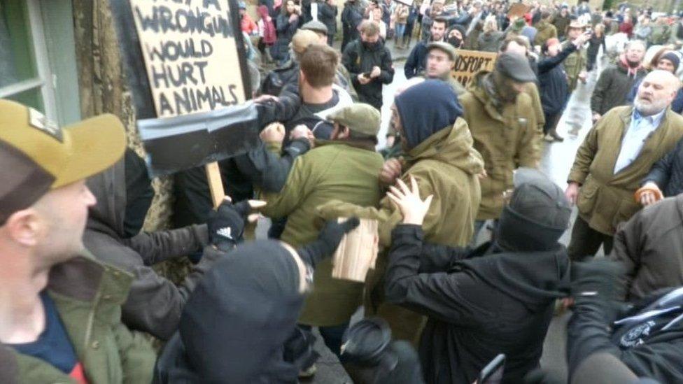 Anti-hunt protesters clash with members of the hunt