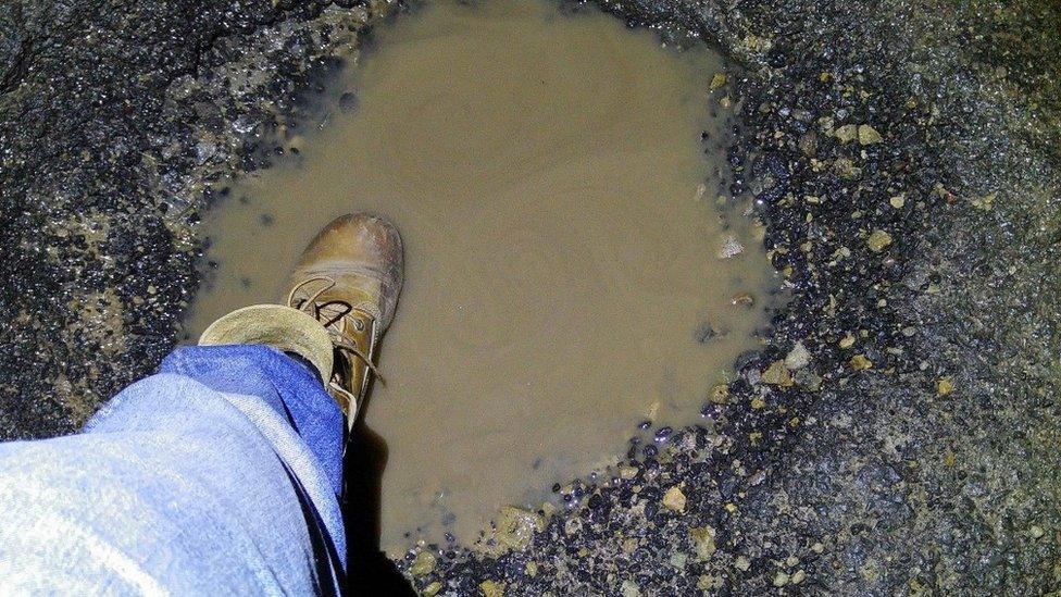 Photo of potholes in Oldham