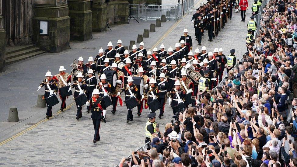 The Royal Marines march down the Royal Mile during an Accession Proclamation Ceremony at Mercat Cross, Edinburgh, publicly proclaiming King Charles III as the new monarch