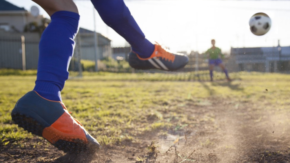 kicking-football