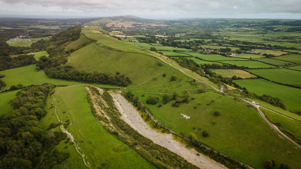 Aerial view of sand lizard installation and surrounding countryside