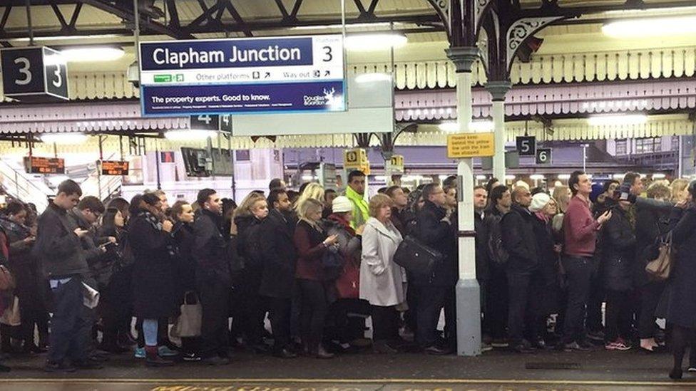 Commuters on a packed platform at Clapham Junction