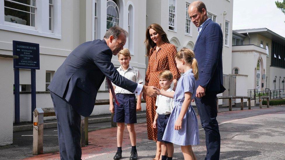 Prince George, Princess Charlotte and Prince Louis, accompanied by their parents the Duke and Duchess of Cambridge, are greeted by Headmaster Jonathan Perry as they arrive for a settling in afternoon at Lambrook School, near Ascot in Berkshire