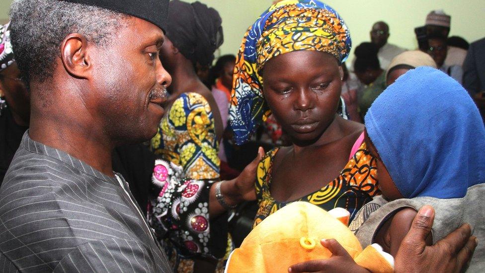 One of the 21 freed Chibok girls cries