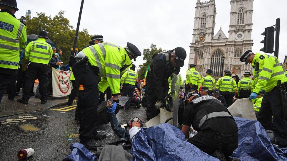 Police moving protesters