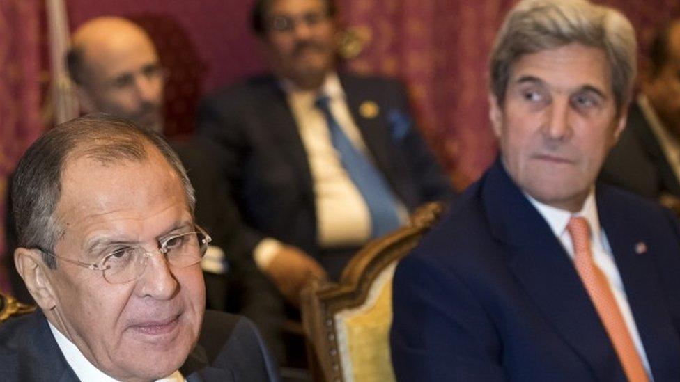 Russian Foreign Minister Sergei Lavrov (left) and US Secretary of State John Kerry (right) attend a bilateral meeting on the crisis in Syria, in Lausanne, Switzerland (15 October 2016)