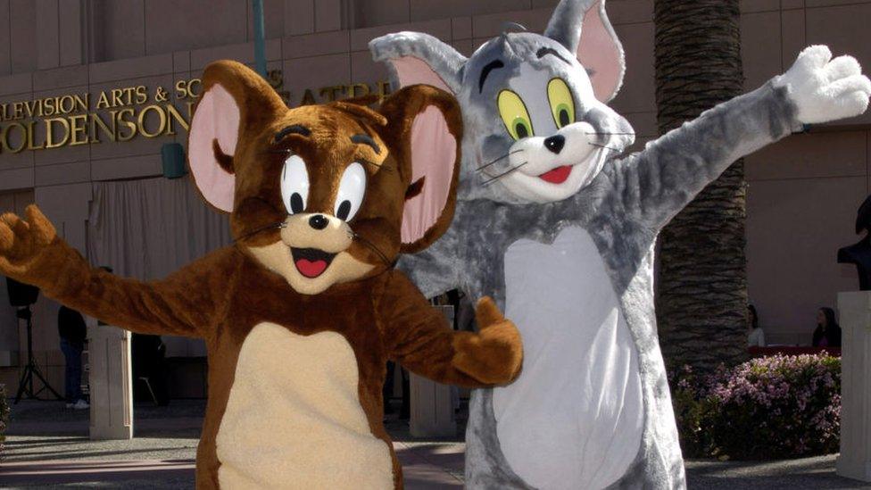 Tom & Jerry waving