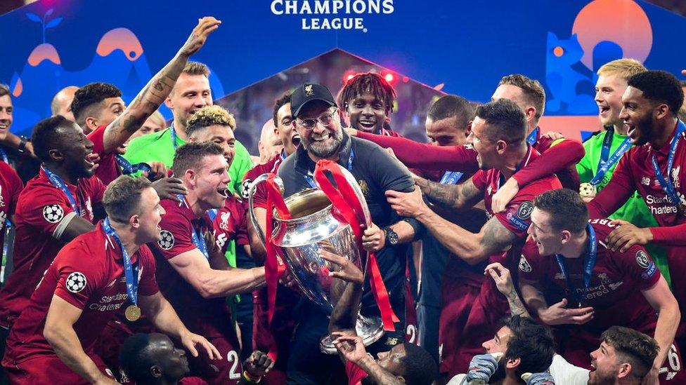 Klopp lifting Champions League trophy