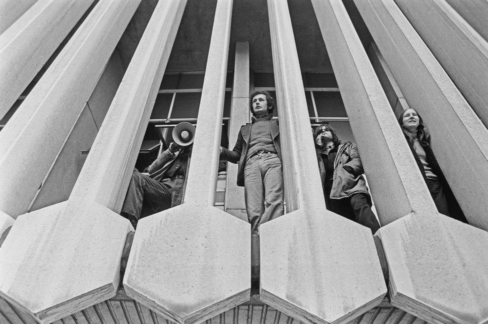 Black and white photo of protesters occupying the Centre Point building on 20 January 1974