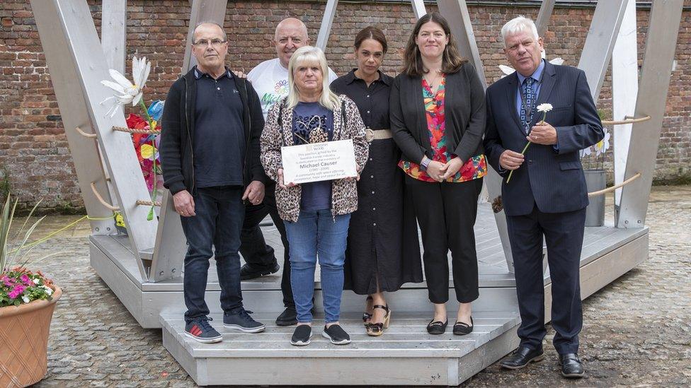 (left to right) Mike and Marie Causer (front, Michael's parents), Steve Mcfarlane (outgoing chair of trustees, Michael Causer Foundation), Racheal Jones (CEO One Knowsley), Emily Spurrell, Graham Morgan