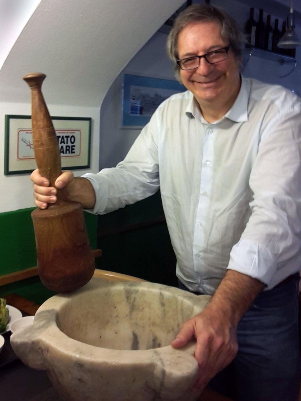 Roberto Panizza with his giant pestle and mortar