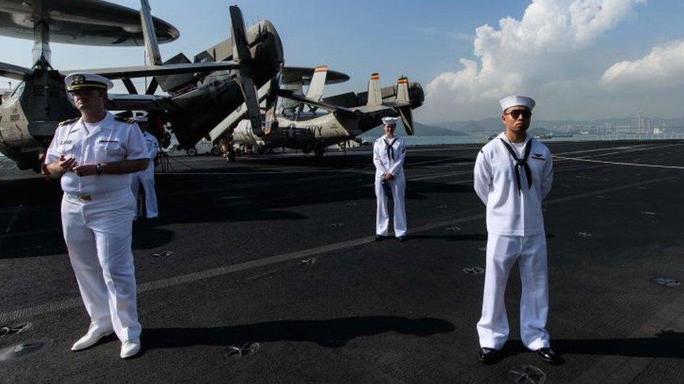 Sailors on the USS Ronald Reagan