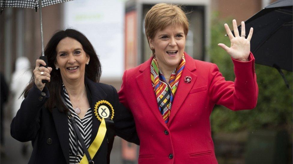 SNP leader Nicola Sturgeon (right) with Margaret Ferrier, SNP candidate for Rutherglen, during her visit to Burnside Pharmacy in Rutherglen