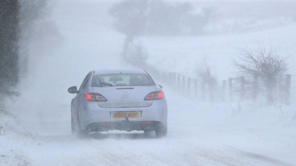 Car driving through snow near Shaftesbury, Dorset