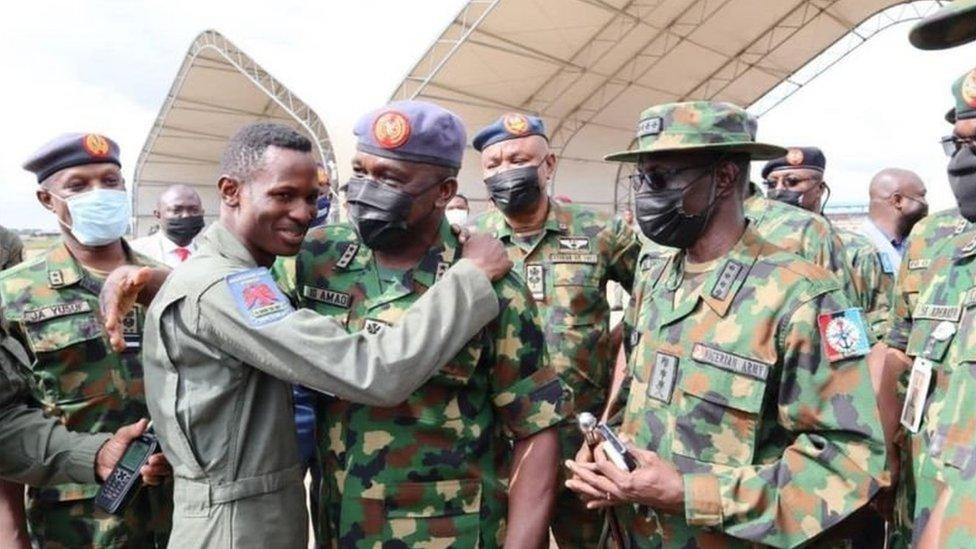 Flight Lieutenant Abayomi Dairo with the Chief of Air Staff, Air Marshal Oladayo Amao