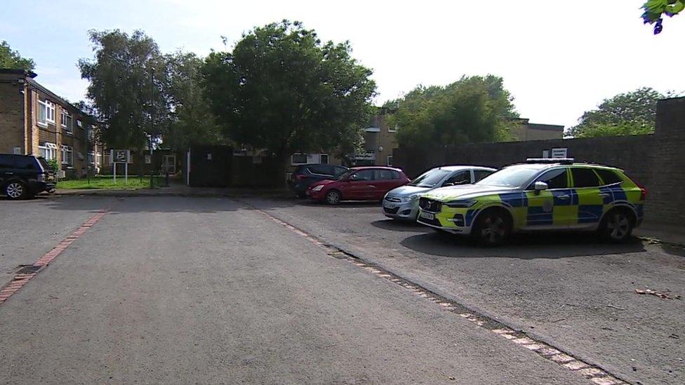 Police car outide Lewis Close