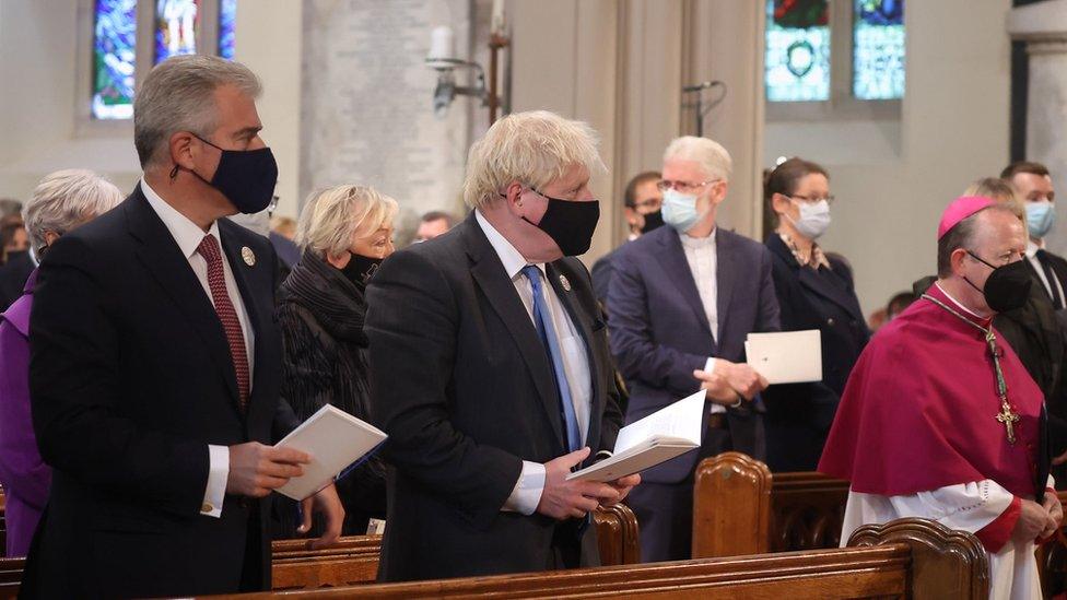 NI Secretary Brandon Lewis. Prime Minister Boris Johnson at the NI centenary church service