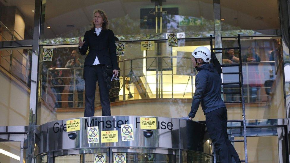 An Extinction Rebellion protester on the Department for Transport