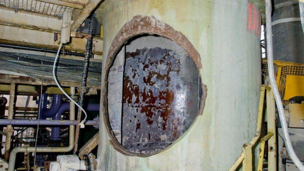 Large metal cylinder with hole inside bearing inner metal layer