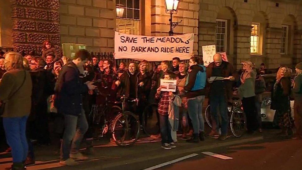 Protesters with banners