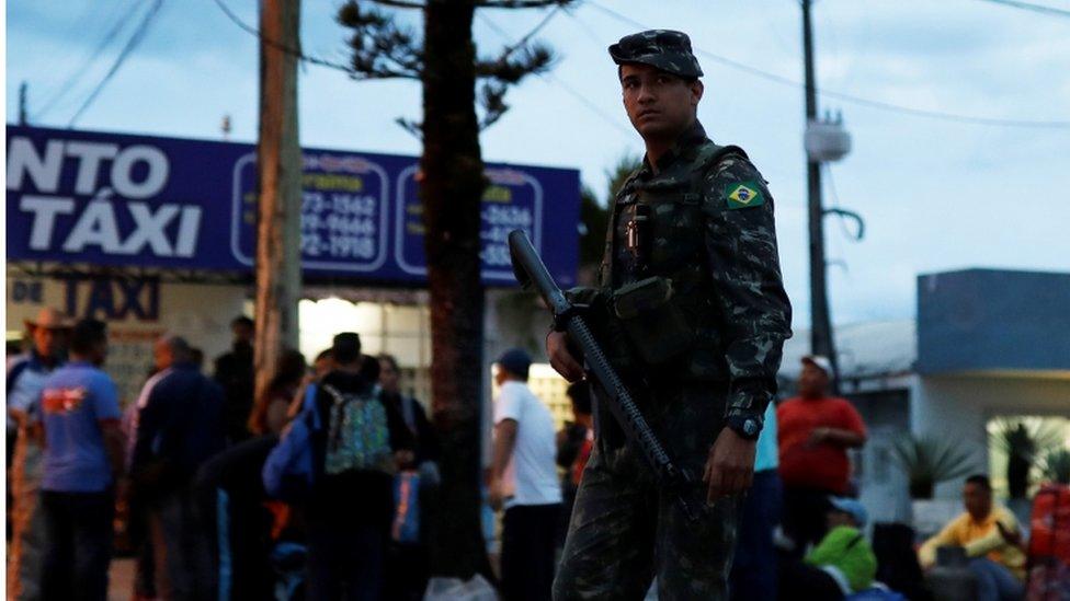 Brazilian guard at Pacaraima crossing on the Brazilian-Venezuelan border, 28 August 2018